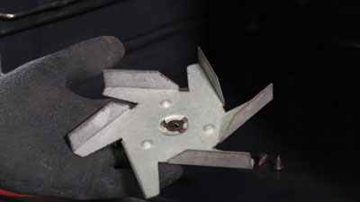 Comment changer le ventilateur de chaleur tournante d’un four ?