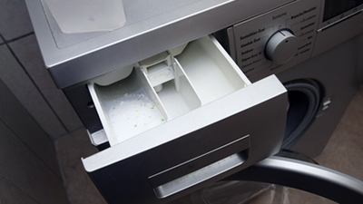 Comment nettoyer le bac à lessive d'un lave-linge ?